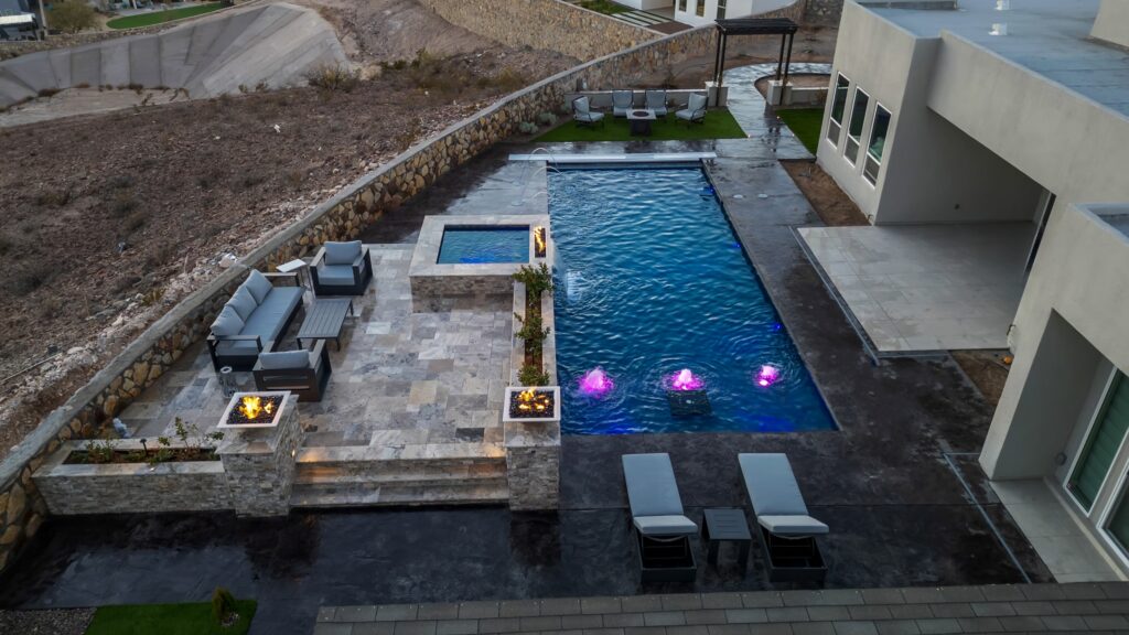 Aerial view of a custom pool, spa, and patio designed by Eraland’s Custom Pools in El Paso, TX